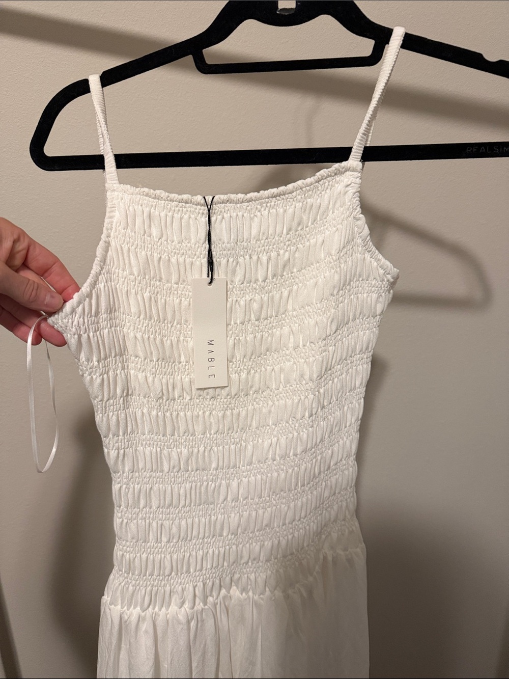 Woman’s White Smocked Maxi Dress with Spaghetti Straps